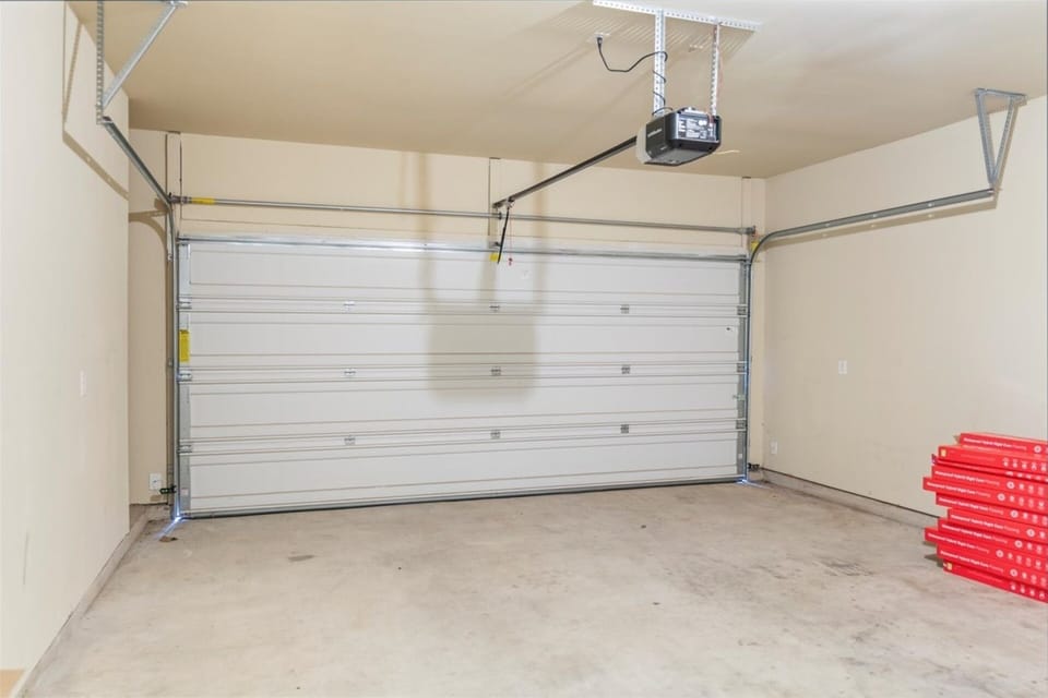 Easy parking for 2 cars in the garage plus another 2 in the driveway. HOA may limit street parking