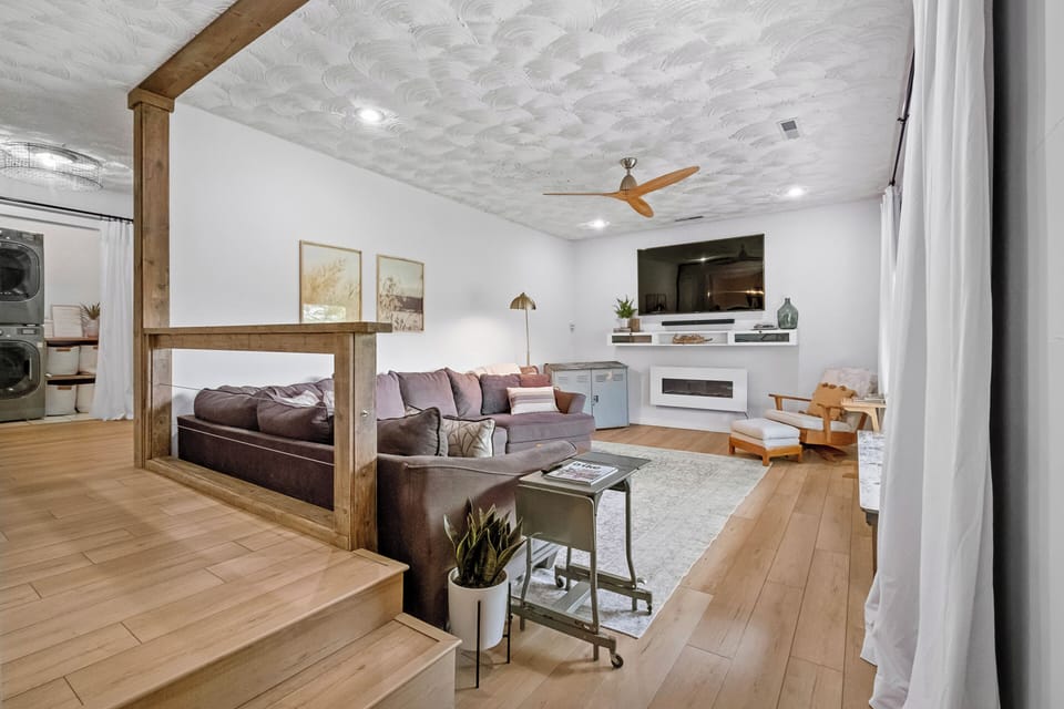 Cozy accommodations and loads of natural light pour into living area!
