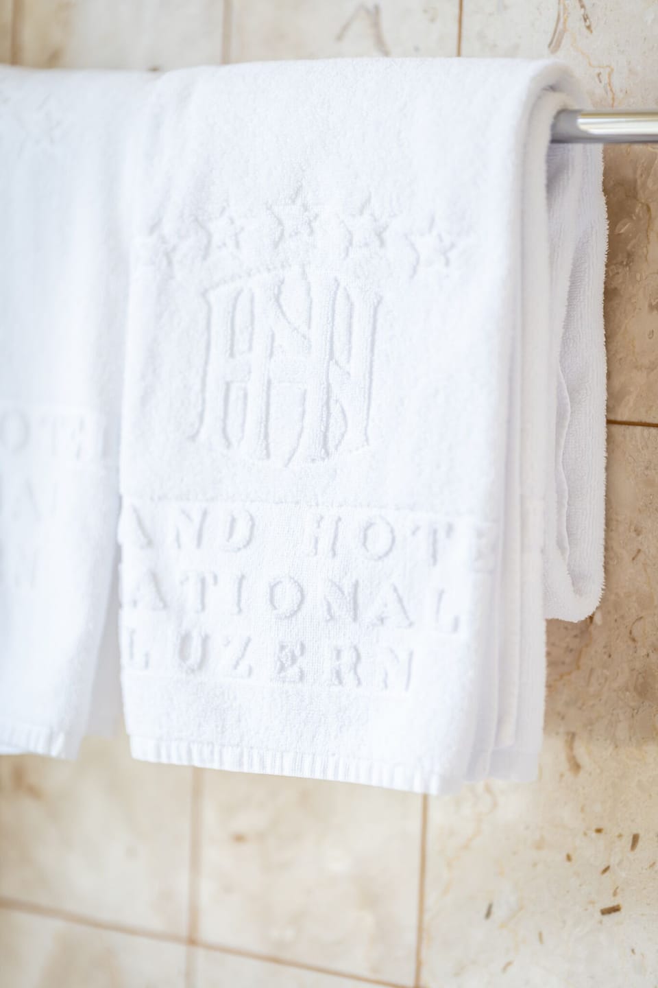 Designer toiletries, hair dryer, bathrobes, slippers