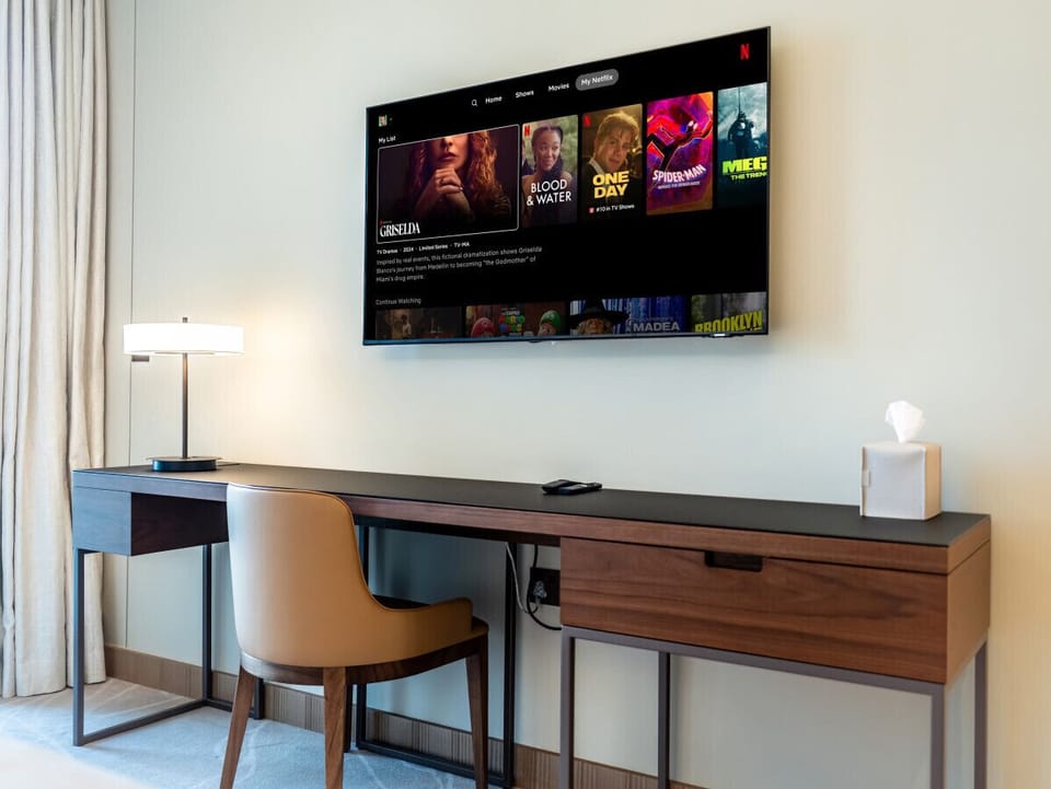 Master bedroom with small desk for work or study
