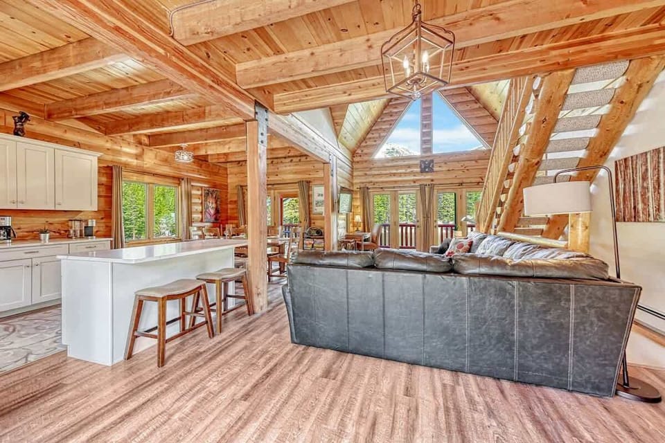 Spacious living area with comfortable couches, perfect for gathering with friends and family.