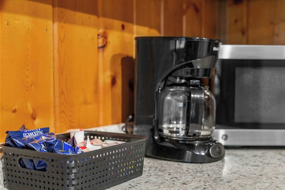 The cabin has a coffee maker and is always stocked with coffee, cream and sugar.