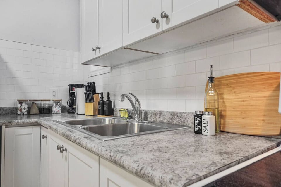 Discover the convenience of a fully equipped kitchen, perfect for preparing your favorite meals or brewing that essential morning coffee. With sleek countertops, modern appliances, and all the cooking essentials at your fingertips, you have everything you