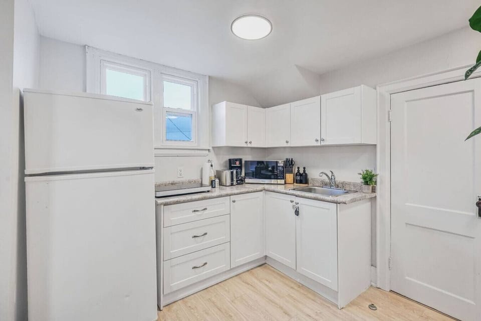 Welcome to your private and well-equipped kitchen. Whether you`re a foodie or prefer simple meals, this space has everything you need, from a full-sized refrigerator to a toaster, coffee maker, and microwave. Enjoy the freedom to prepare your own meals on
