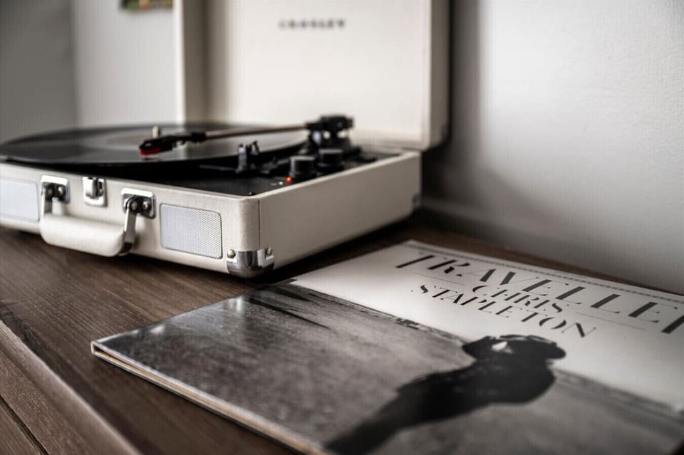 There is a record player in the bedroom along with a few records provided to enjoy your favorite hits.