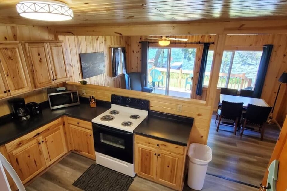 Otter Cabin-Lakeside 2 Bedroom Otter Cabin on Kab | Private kitchen | Full-size fridge, microwave, coffee/tea maker, toaster