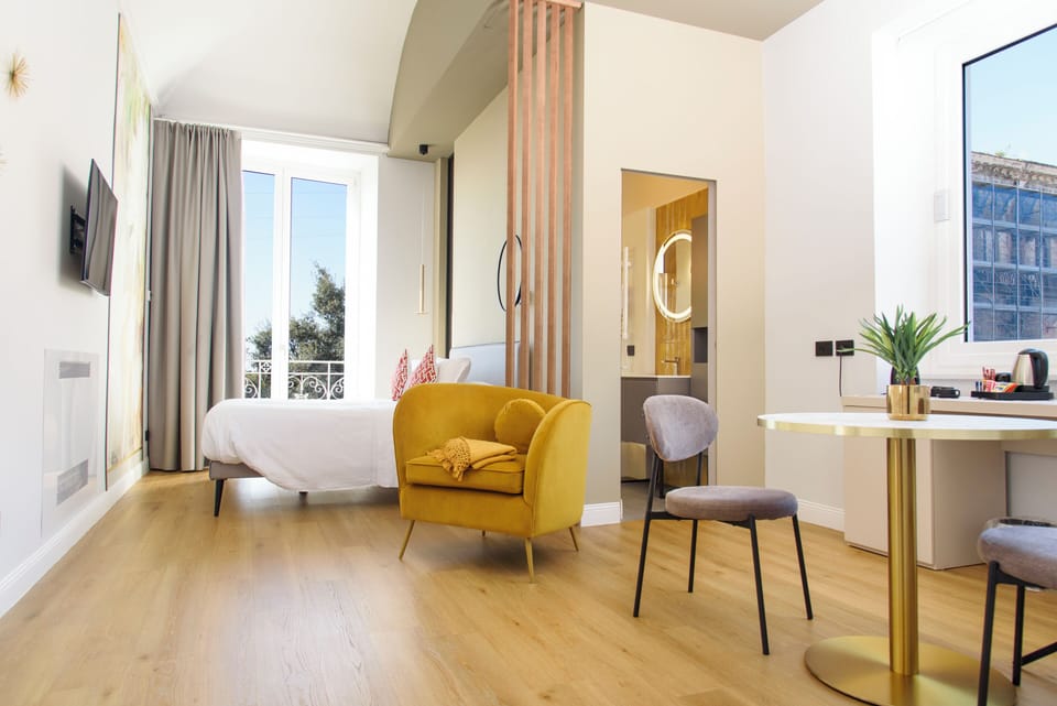 Deluxe Double Room | Down comforters, in-room safe, laptop workspace, blackout drapes