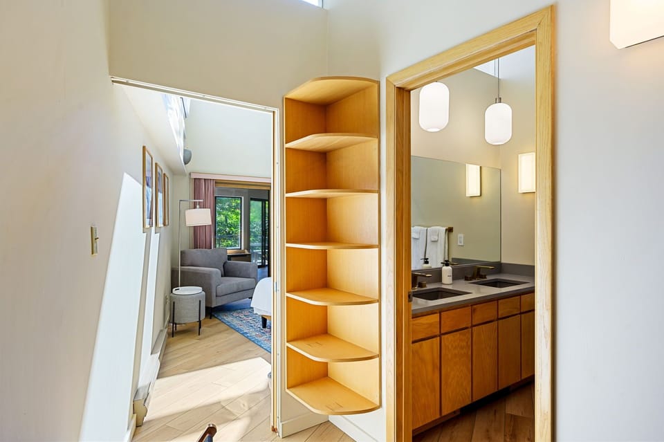 Whether you're getting ready for the day or winding down at night, this stylish and functional space has you covered!
