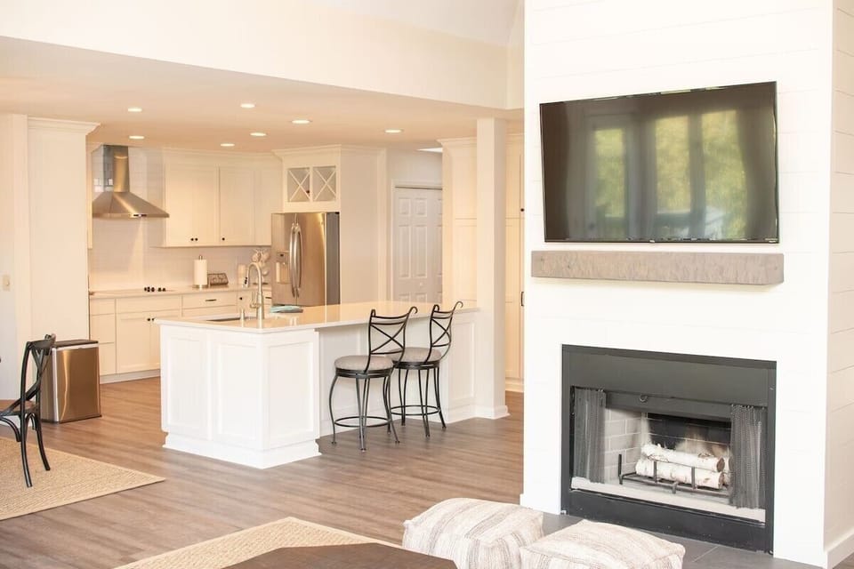 Bright, open living room, dining room and kitchen  