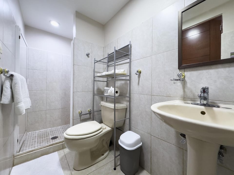 Bright, modern bathroom with spacious walk-in shower
