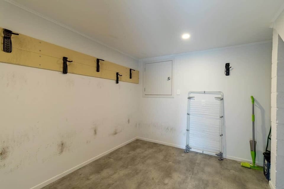 Secure bike room downstairs with a side door from outside to easily store bikes for the night.
