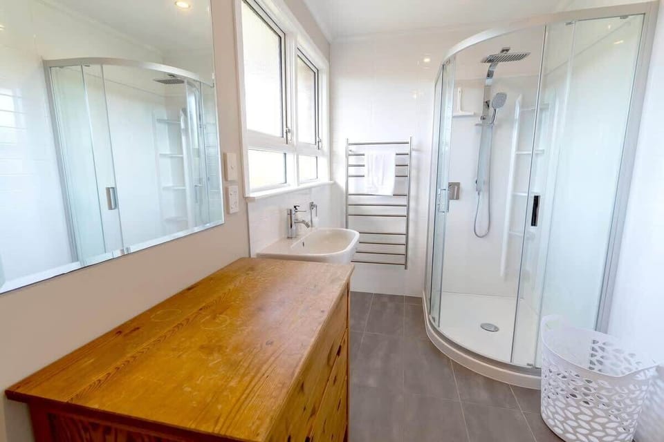 Main bathroom with toilet and shower