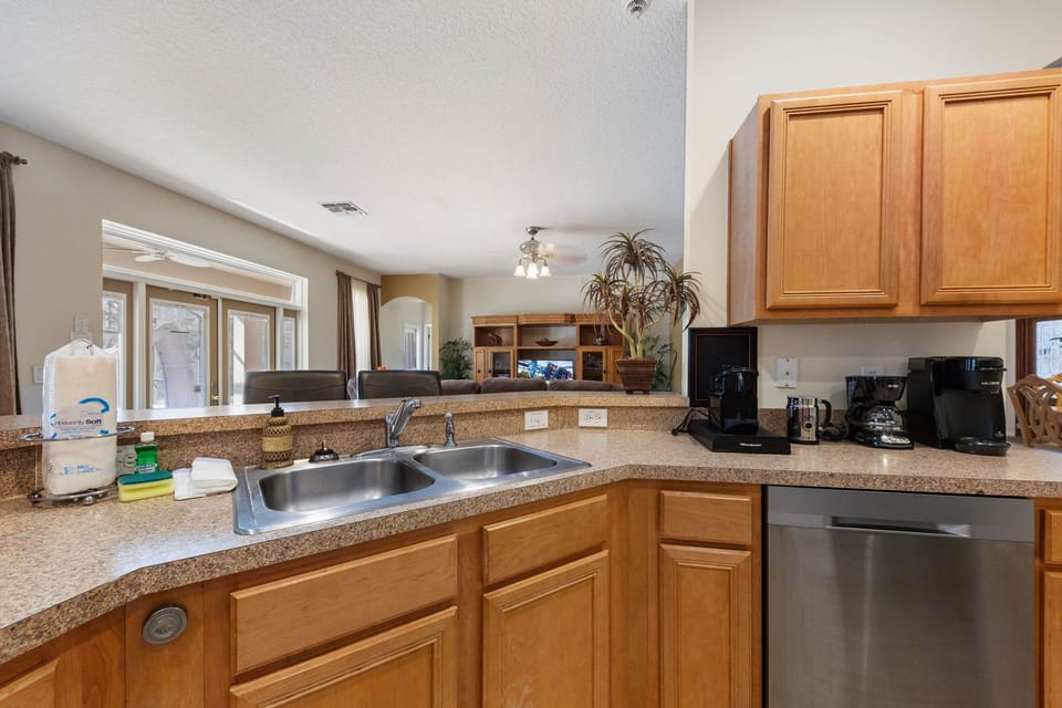 Cook like a pro in a fully equipped kitchen with stainless-steel appliances, granite countertops, and modern design.