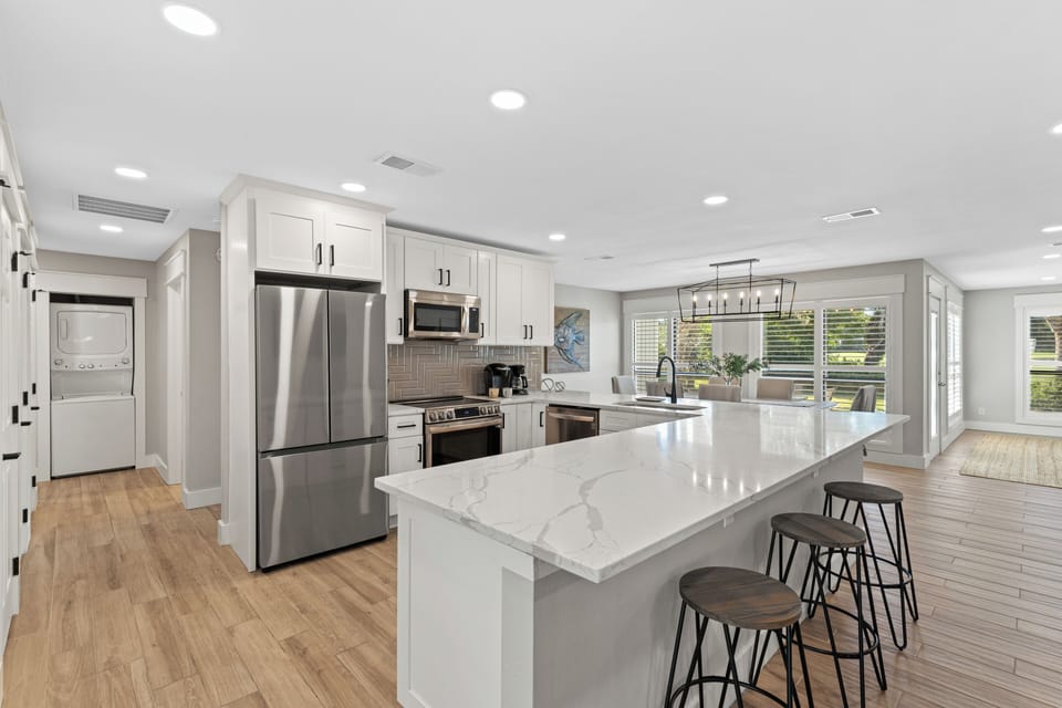 The kitchen has been fully renovated and thoughtfully updated with modern finishes and amenities.