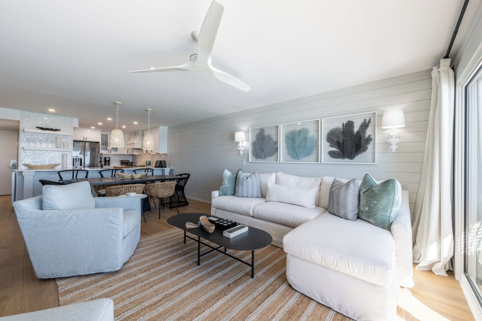 The living room is the perfect place to gather together — whether you’re relaxing with a movie night or stepping out onto the balcony to enjoy the fresh air and views.