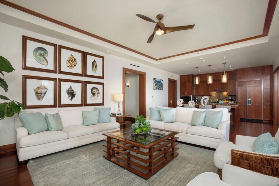 A space where beachy blues and shell prints meet soft rugs and sunny moods for a truly ocean-kissed unwind   