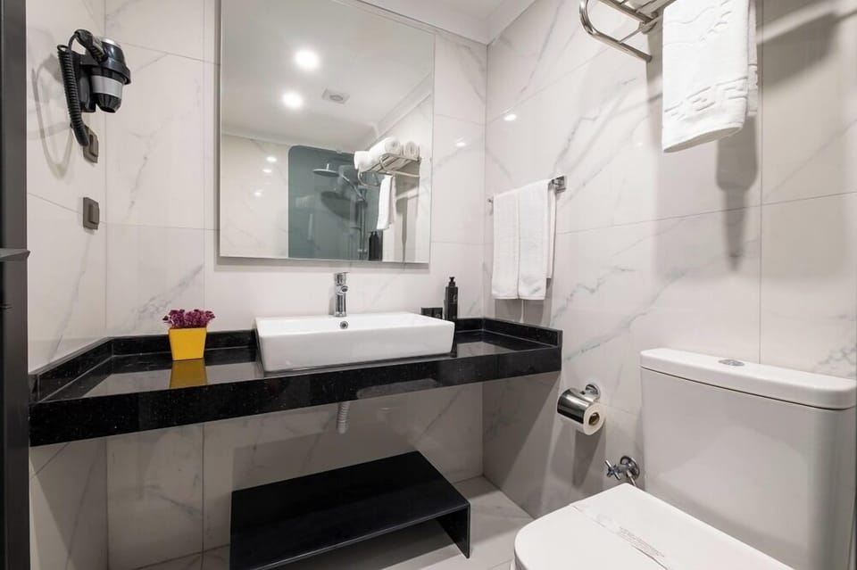 Standard Room | Bathroom | Free toiletries, hair dryer, slippers, towels