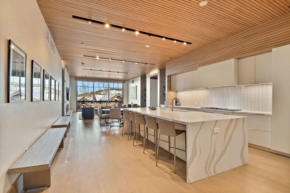 View from Foyer into Kitchen/ Dining/ Living Area