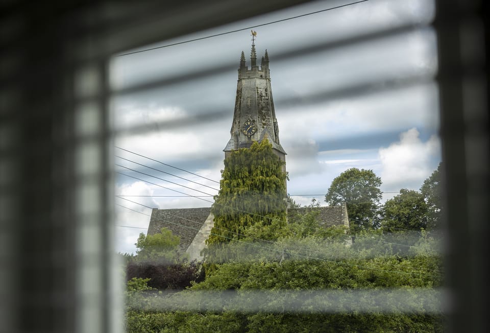 View of the spire of The Holy Trinity Church in Minchinhampton
