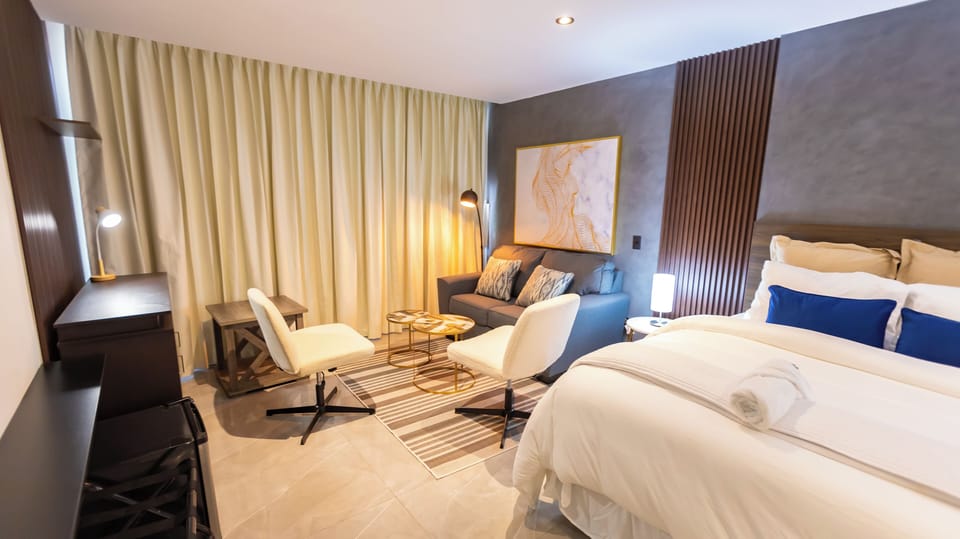 Luxury Suite, Pool View | Premium bedding, desk, laptop workspace, WiFi (free)
