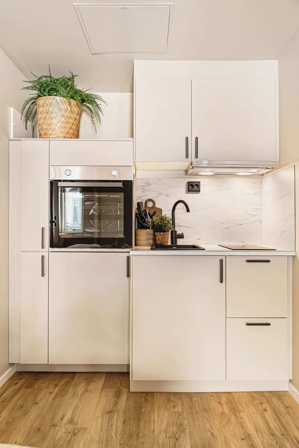Clean and simple design with everything you need to cook and unwind.