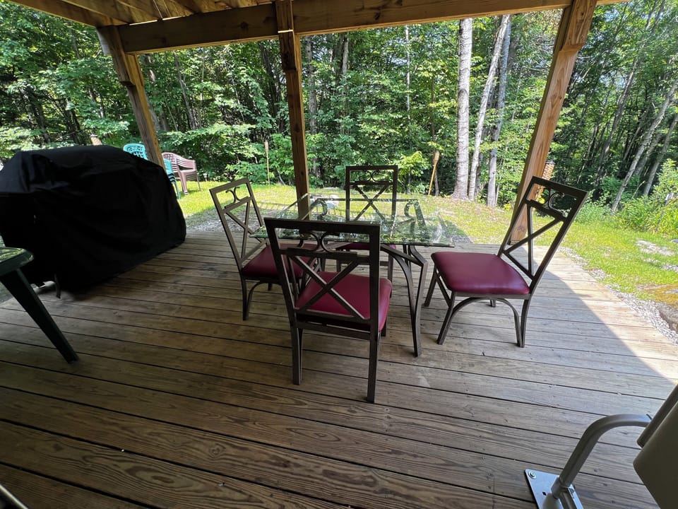 Private deck with grill and dining—great for coffee or BBQs.