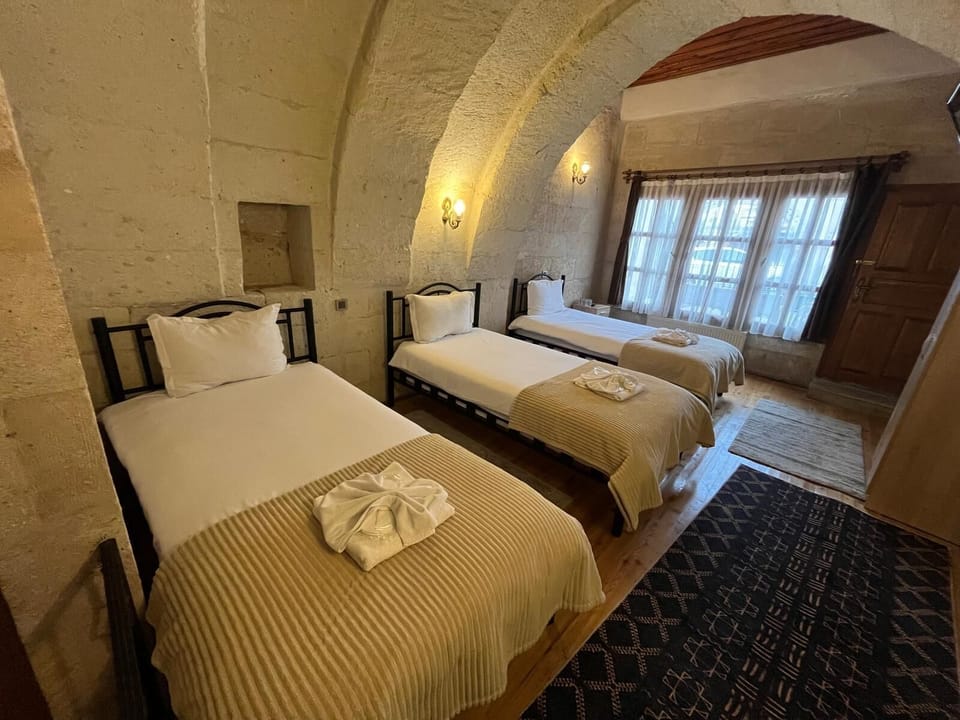 Standard Quadruple Room | Soundproofing, bed sheets