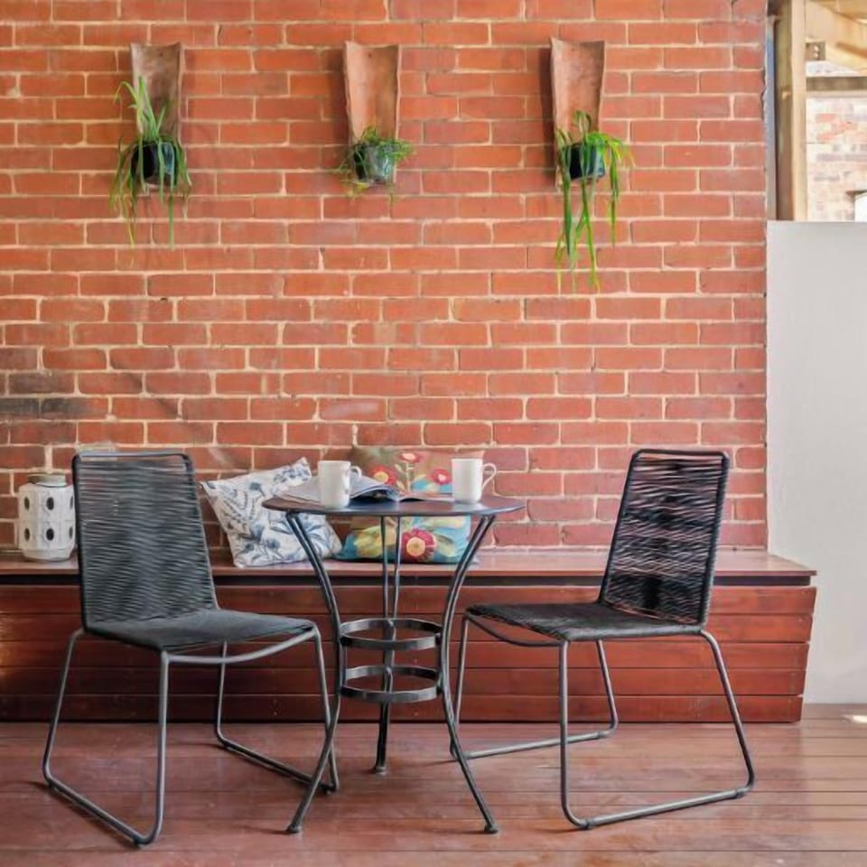 DECK: The covered deck with bench seating is perfect for outdoor living and relaxing. Enjoy.  