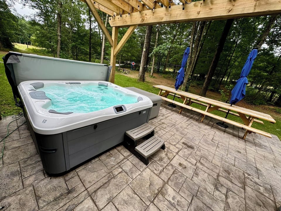 Hot tub with a view! This is a guest favorite, especially when they have been able to see wildlife passing through.
