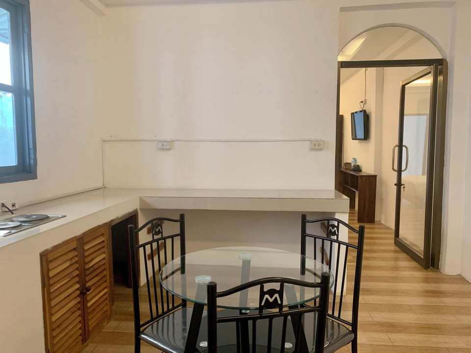 Standard Triple Room | In-room safe, desk, laptop workspace, blackout drapes