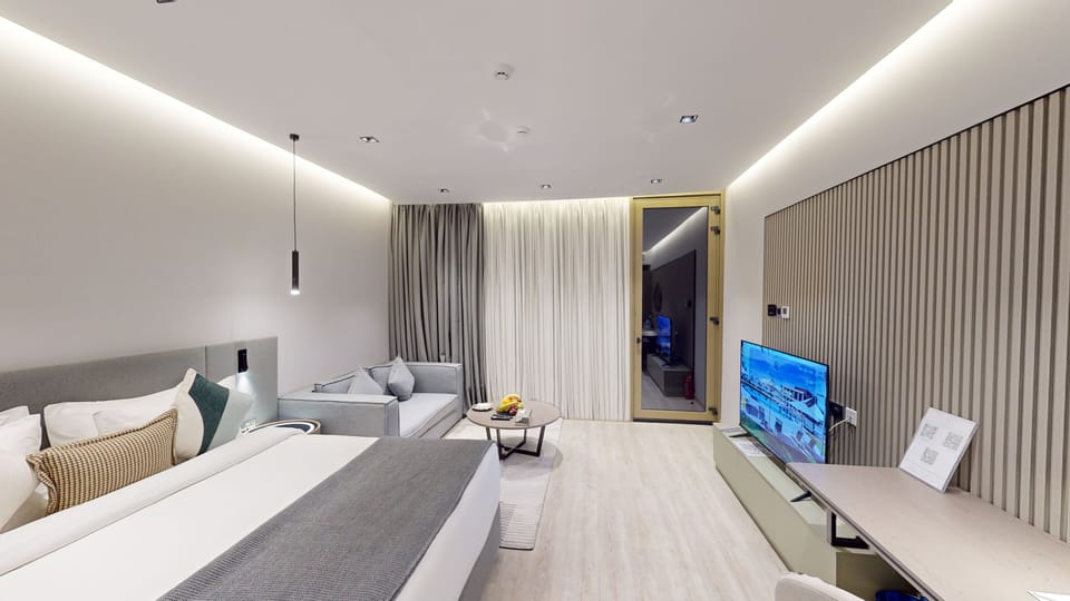 Superior Room, Balcony, Partial Sea View | In-room safe, desk, laptop workspace, blackout drapes