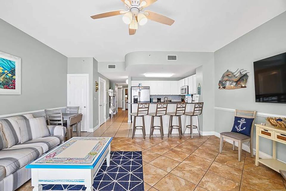Condo, 1 King Bed with Sofa bed (Calypso 2-103 West - Dolphin View) | Living area | TV