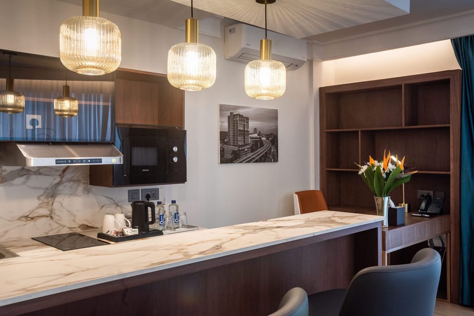 Executive Suite with Balcony | Premium bedding, down comforters, in-room safe, desk