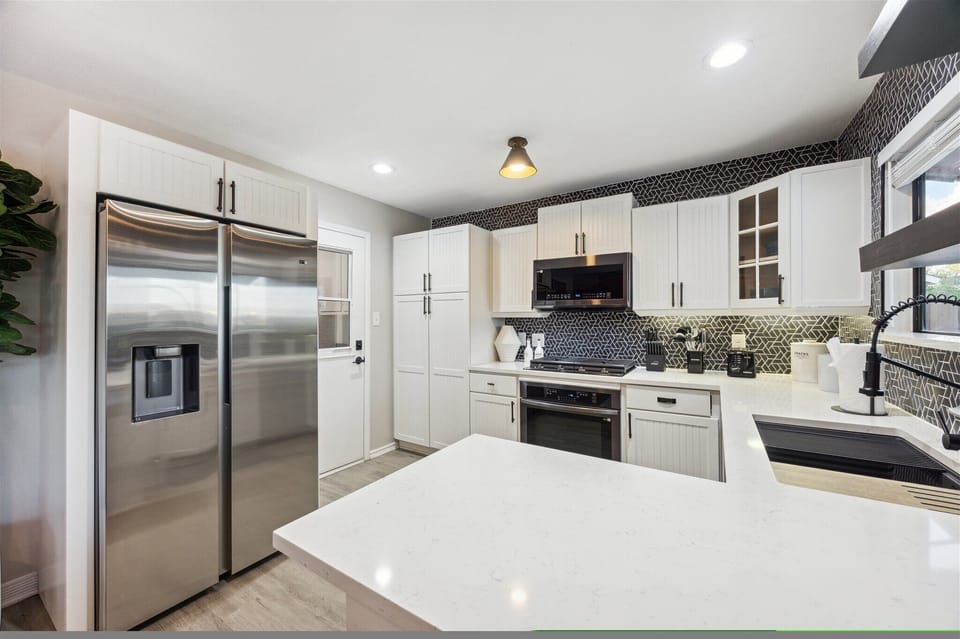 Kitchen with stainless steal Samsung appliances. 