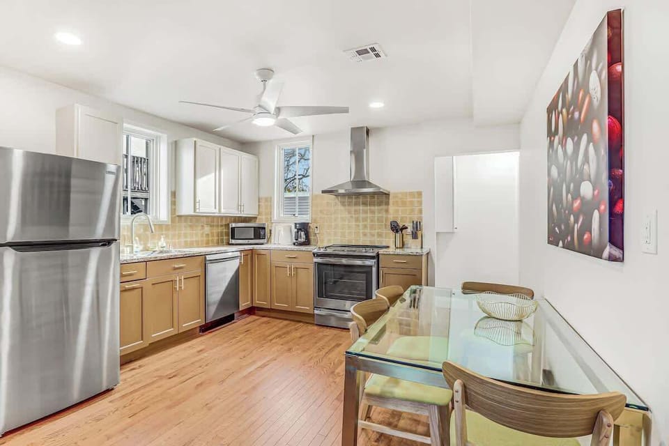 Our updated and open concept kitchen has everything you need to cook up a great meal.  The dining table can fit 6 if you pull the table from the wall and add additional chairs from inside the house. 