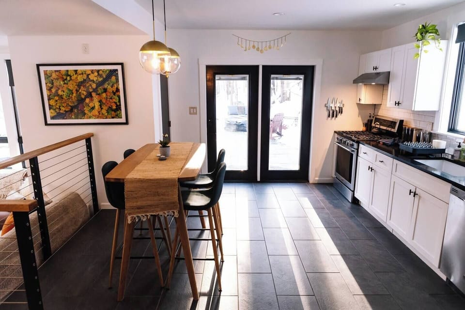 Kitchen. A lot of light and leads to the outside patio.