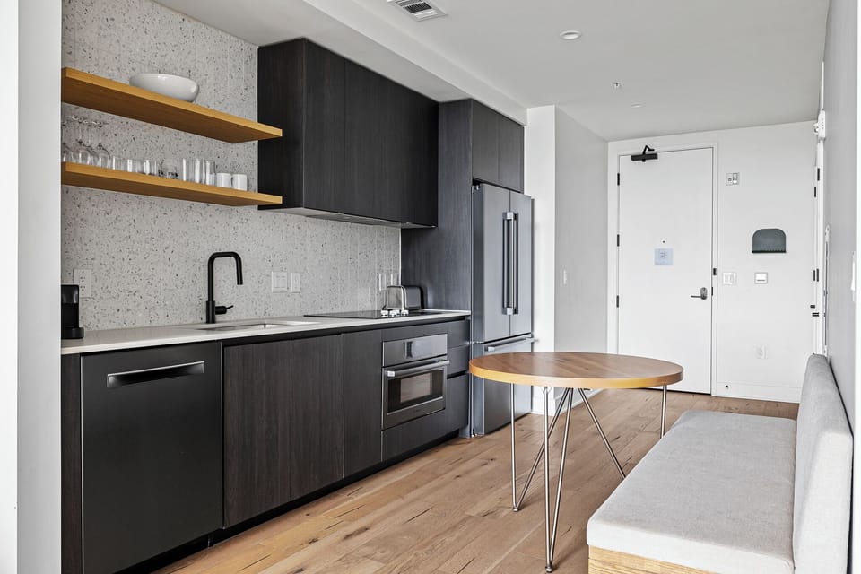Condo, 1 King Bed with Sofa bed, City View | Private kitchen | Full-size fridge, microwave, oven, stovetop