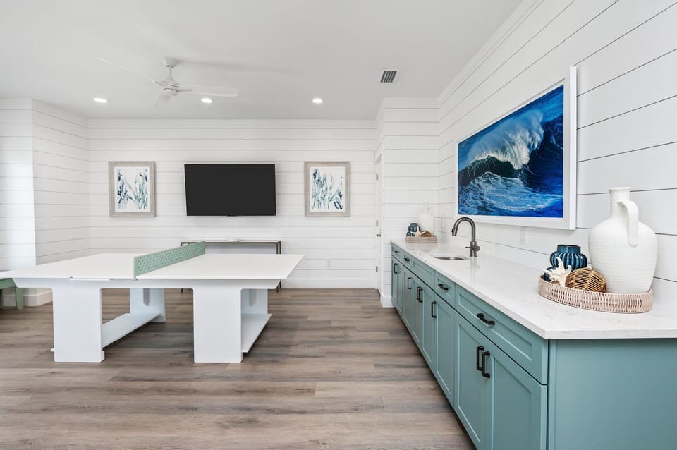2nd floor game area with two 65" HDTVs—perfect for game day!
