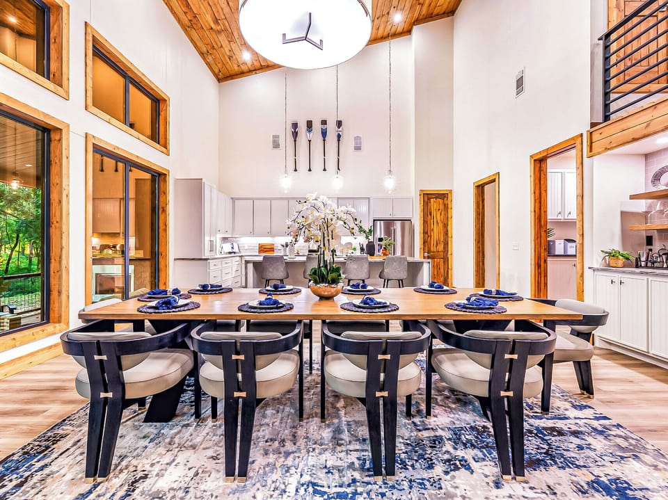 DINING TABLE | comfortably seating 10 guests in the table and 4 stools in the counter