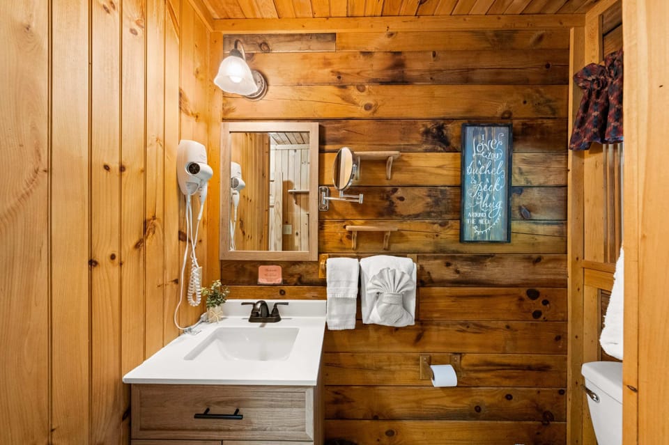 The primary ensuite bathroom has all the bath essentials including a hairdryer.