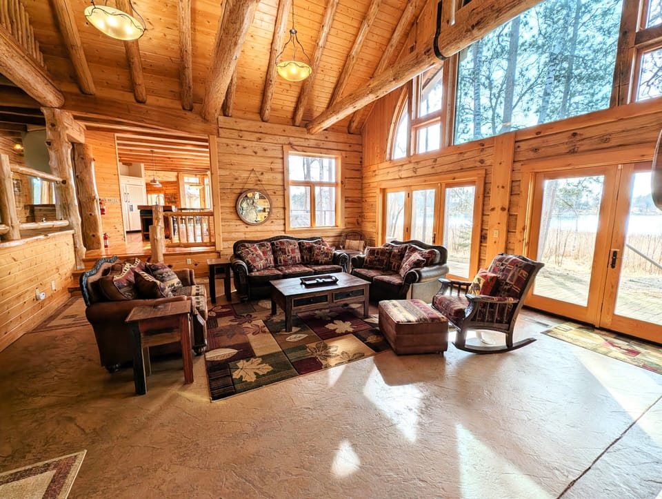 Living Area w/ Fireplace & River View