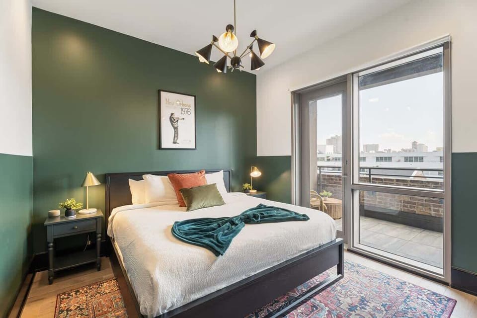 The second bedroom offers a cozy king bed, dresser, smart TV, and soft linens. Great for families or friends traveling together, this room combines comfort and privacy in the heart of Downtown New Orleans.