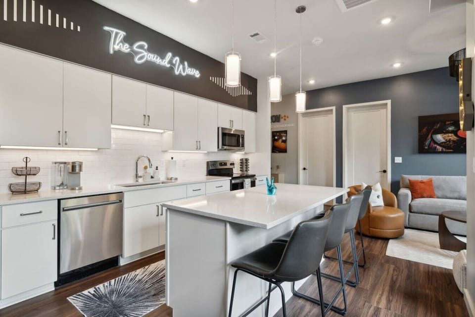 Fully stocked kitchen with everything you need—plus a Keurig + starter K-Cups to kick off your mornings. Enjoy modern appliances, spacious countertops, and an island made for breakfast (or late-night snacks).