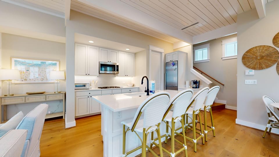Fully stocked kitchen with island seating!