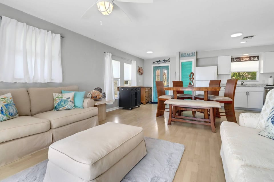 The main living space includes living, dining and kitchen - all opening to the 2nd floor balcony overlooking the Bay at the back of the property.