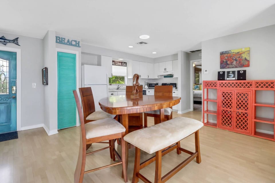 The open dining space efficiently flows right into the kitchen.