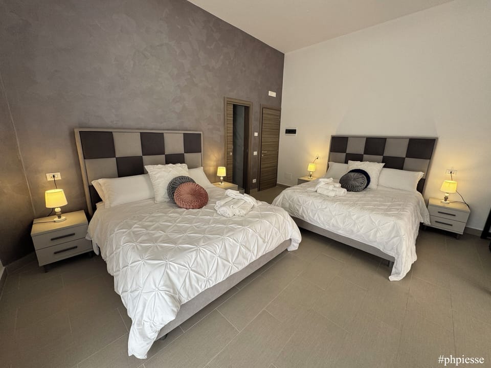 Emerella Luxury Family Suite Room 6 | Premium bedding, down comforters, individually decorated