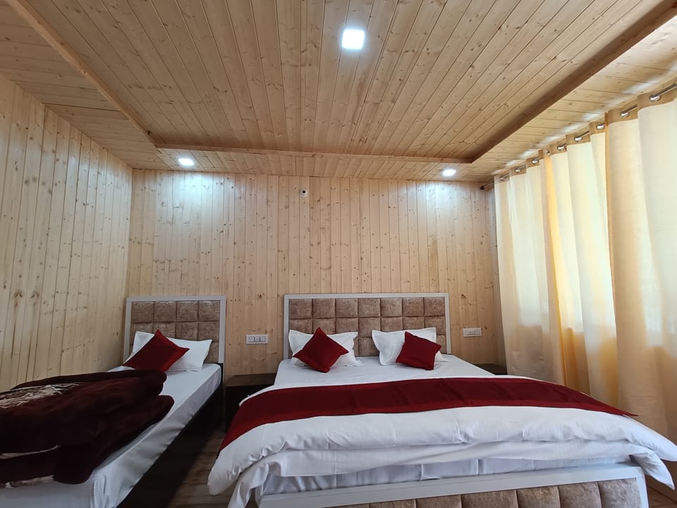 Deluxe Triple Room, Balcony | Desk, laptop workspace, iron/ironing board, free WiFi