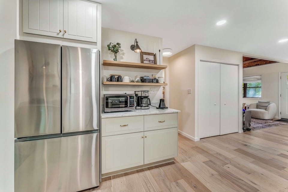 Modern kitchen featuring sleek stainless steel appliances!
