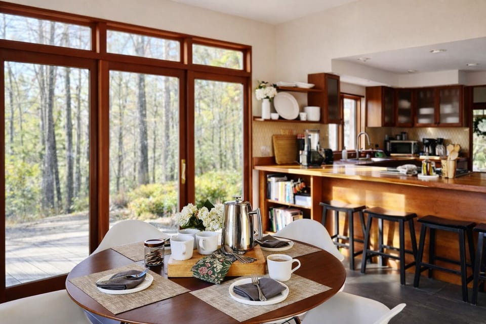 The sun-drenched breakfast table seats 4-6 and is a cheerful way to start the day.